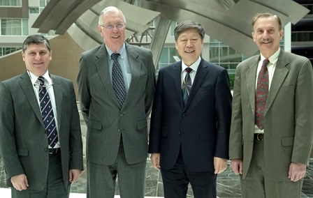 Drs. Richard Hoffman, Oliver Roche and Frank Shipper with Zhang Ruimin 